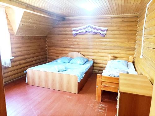 Un ou plusieurs lits dans un hébergement de l'établissement Мала Одеса