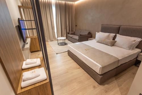 Postel nebo postele na pokoji v ubytování South Inn Hotel