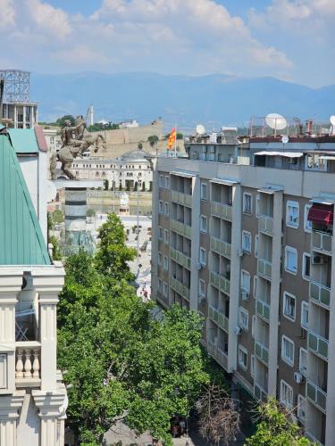 an aerial view of a city with buildings at Fantazy Apartment Main Square in Skopje