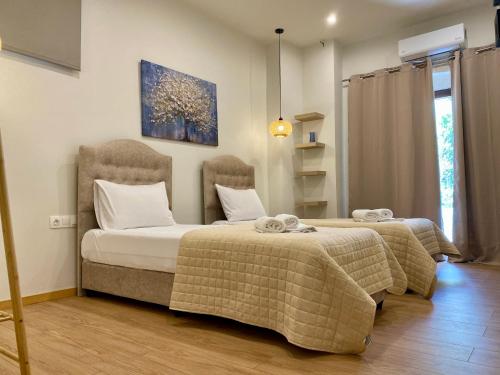 Ένα ή περισσότερα κρεβάτια σε δωμάτιο στο Stone Luxury Suite
