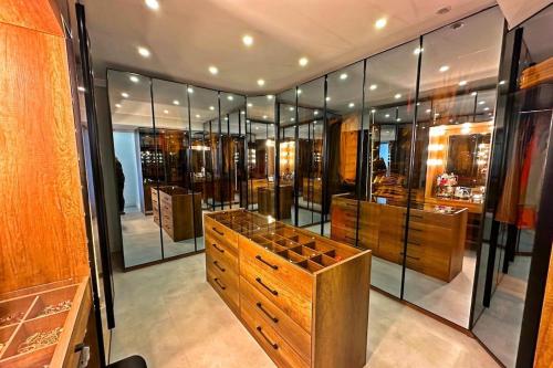 a display case in a store with many glass windows at Cloud Nine by Alara - Luxury Private Pool and Garden Villa in Beylikduzu