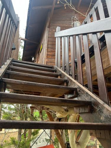 a set of stairs leading up to a house at Hotel Jakue in Puente la Reina