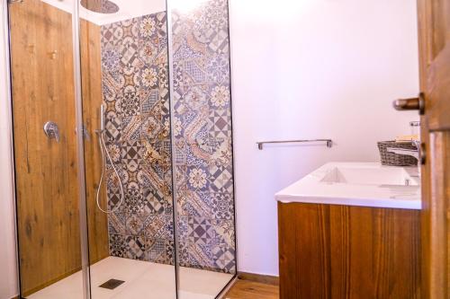 a bathroom with a shower and a sink at Agriturismo Tenute Mauro in Ispica