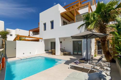 an image of a villa with a swimming pool at Clementina Paros in Naousa