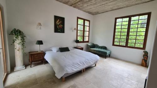 Postel nebo postele na pokoji v ubytování Maison - chambres d'hotes
