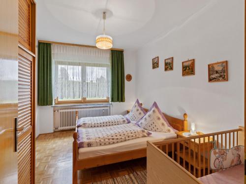 Ένα ή περισσότερα κρεβάτια σε δωμάτιο στο Cozy Apartment in Sonnen Bavaria near Forest