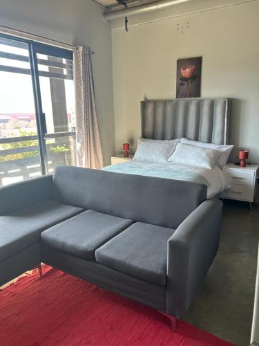 Ένα ή περισσότερα κρεβάτια σε δωμάτιο στο HallMark House 606