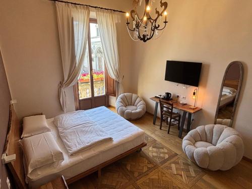 Postel nebo postele na pokoji v ubytování Hotel Le Due Fontane