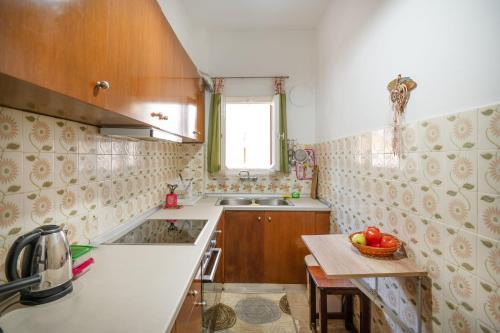 Η κουζίνα ή μικρή κουζίνα στο Anthia Apartment