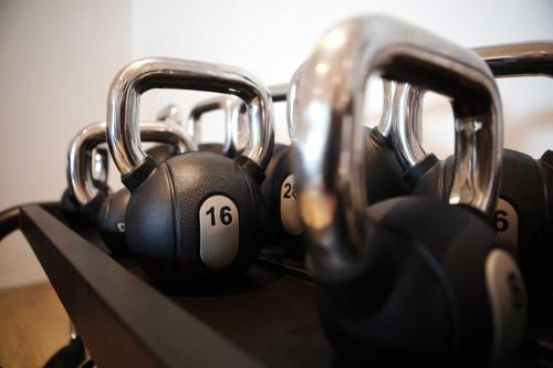 a row of headphones sitting in a rack at Porto Plomari in Plomarion