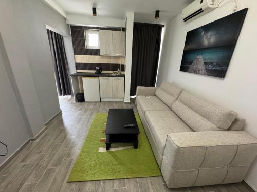 Η κουζίνα ή μικρή κουζίνα στο Etna Apartments