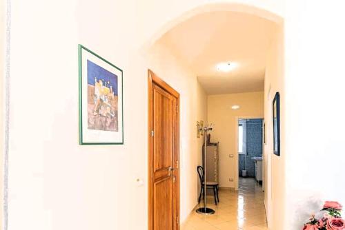 a hallway with a door to a room at Bellezza In Cilento Panoramic Apts in Castellabate