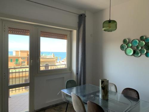 Μπαλκόνι ή βεράντα στο Pontile di Ostia Rutilio Namaziano Flat