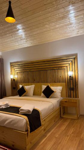 Postel nebo postele na pokoji v ubytování De Reeva Resort Pangong