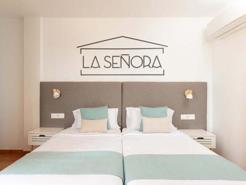 Ένα ή περισσότερα κρεβάτια σε δωμάτιο στο Apartamentos La Cebada