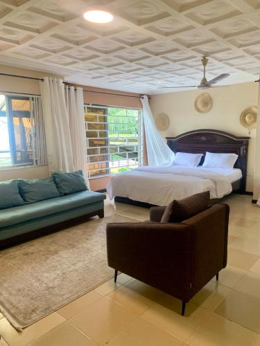 Ένα ή περισσότερα κρεβάτια σε δωμάτιο στο Peters Rock Ecolodge