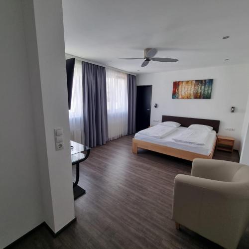 Ένα ή περισσότερα κρεβάτια σε δωμάτιο στο Hotel Central