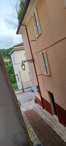 a view of a building from the side of a street at Atina House - Centro Storico in Atina