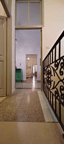 an open door to a room with a hallway at Atina House - Centro Storico in Atina