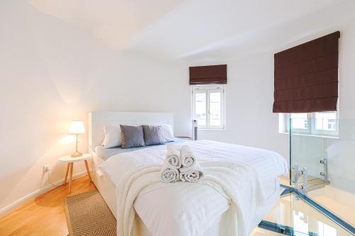 Postel nebo postele na pokoji v ubytování Stevan Apartment