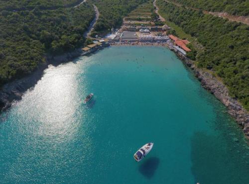 two boats in a large body of water at RomaOlyaHouse in Budva