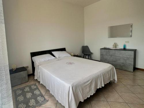 Ένα ή περισσότερα κρεβάτια σε δωμάτιο στο Casa Oristano Mare & Citta' bis