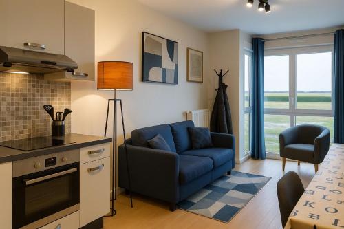 Η κουζίνα ή μικρή κουζίνα στο Appartement Cosy Proche Disneyland - tout Confort