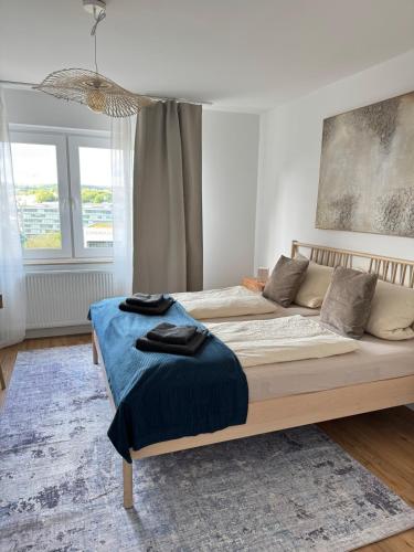 Postel nebo postele na pokoji v ubytování Cozy Apartment Wolke2 mit Balkon