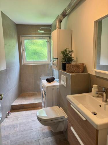 Koupelna v ubytování Cozy Apartment Wolke2 mit Balkon