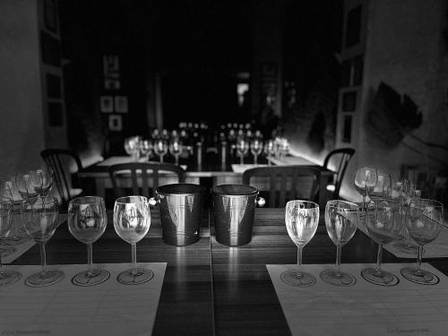 a group of wine glasses sitting on a table at Atina House - Centro Storico in Atina