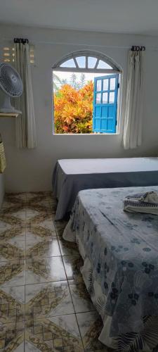 Katil atau katil-katil dalam bilik di Casa Orí Ayô