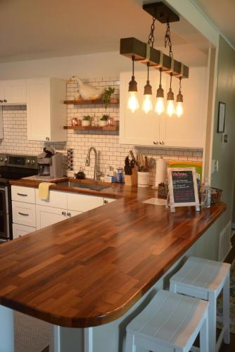 a kitchen with a wooden counter top in a kitchen at Eagles Beach Nest II in New Buffalo