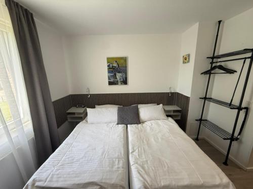 Postel nebo postele na pokoji v ubytování Swetis Passage