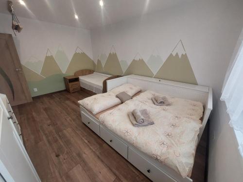 Postel nebo postele na pokoji v ubytování Trendy Family Apartment