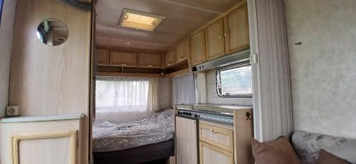 Kuchyň nebo kuchyňský kout v ubytování Caravan Romsicht Sneek