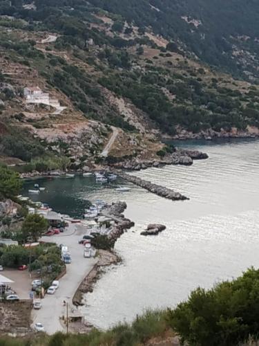 an aerial view of a beach with boats in the water at Sofias house at Agkona Kefalonia in Angón