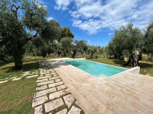 Πισίνα στο ή κοντά στο Pilone del Monaco Apartment 9
