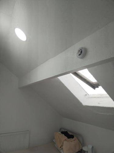 a ceiling with a skylight in a room at Balfour Street in Bradford