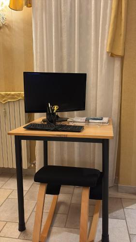 Una televisión o centro de entretenimiento en Panoramic & Exclusive Suite