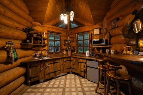 Kuchyňa alebo kuchynka v ubytovaní Forest House exclusive