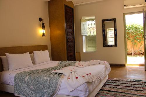 Postel nebo postele na pokoji v ubytování Villa Dar 55 - Berber House