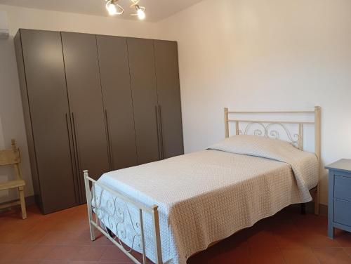 Postel nebo postele na pokoji v ubytování Appartamento Oliver2
