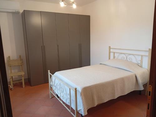Postel nebo postele na pokoji v ubytování Appartamento Oliver2