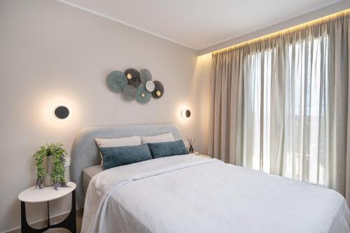 Postel nebo postele na pokoji v ubytování Gardenia apartments