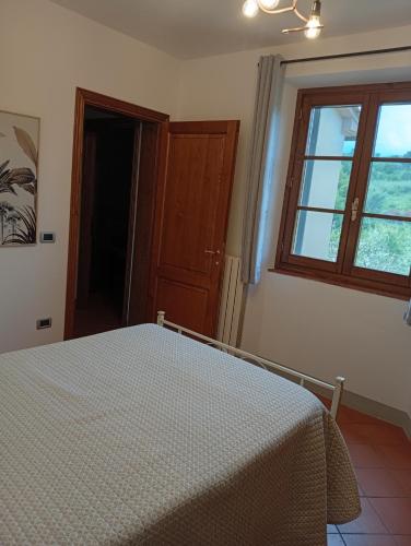 Postel nebo postele na pokoji v ubytování Appartamento Oliver2