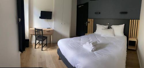 Katil atau katil-katil dalam bilik di Auberge anglefort