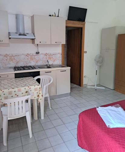 Kuchyň nebo kuchyňský kout v ubytování Casa inn