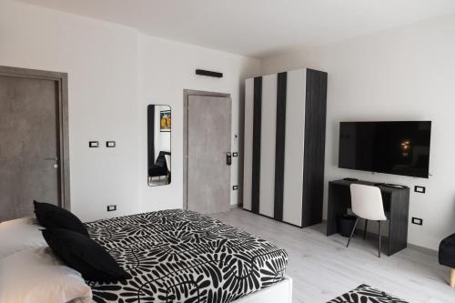 Postel nebo postele na pokoji v ubytování Affittacamere Poerio