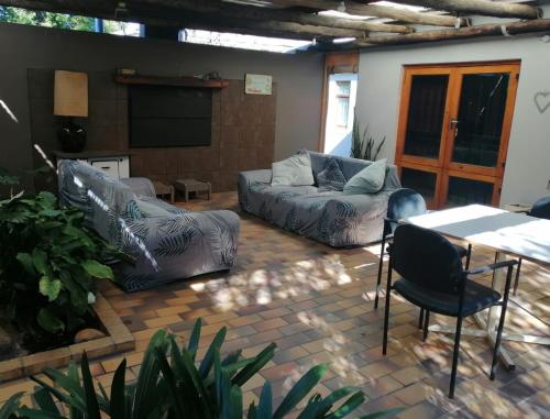 Posezení v ubytování Die Tuis Huis Selfcatering NO LOADSHEDDING