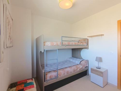 Posteľ alebo postele v izbe v ubytovaní Ayf 3 habitaciones en 1ª linea de playa